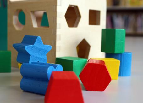 Wooden blocks sit on the shelves of the Evesham Library