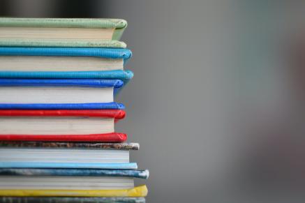 A stack of brightly colored books.