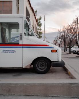 A mail truck sits ready to start the morning run.