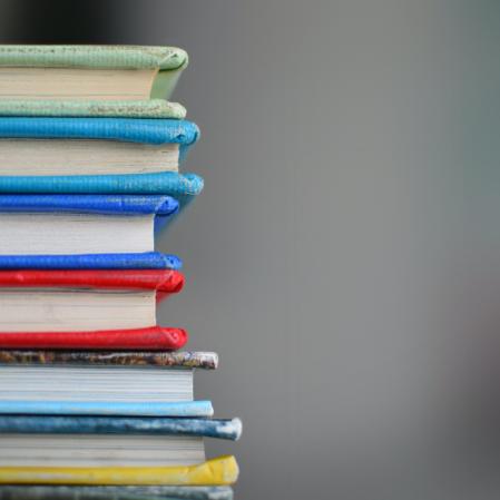 stack of books that are different colors