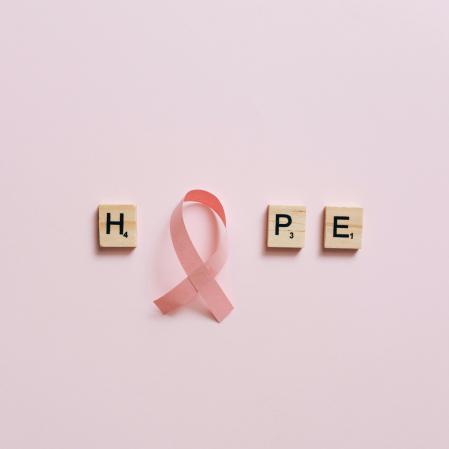 HOPE in scrabble letters but the O is a breast cancer ribbon