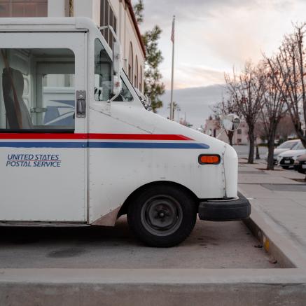 A mail truck sits ready to start the morning run.