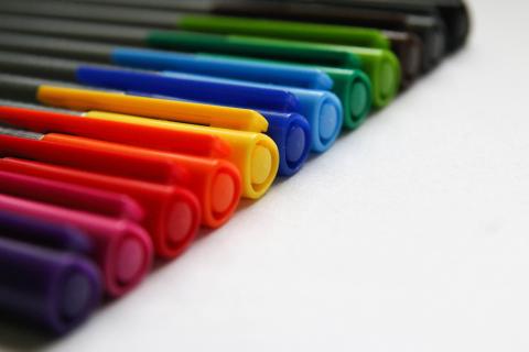 Markers arranged in a line.