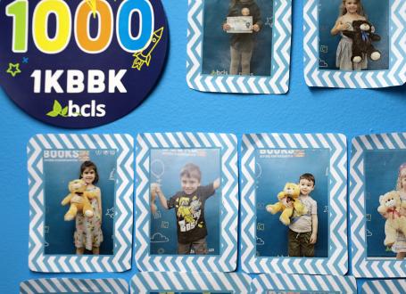 WHen children complete our 1KBBK program, they have the option of having their picture on our wall!