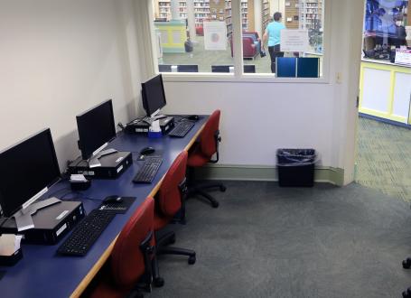 Bordentown Library's Technology Center featres several PCs arranged so that the space can be used for private research or for group learning.