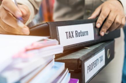 Tax returns being prepared and organized
