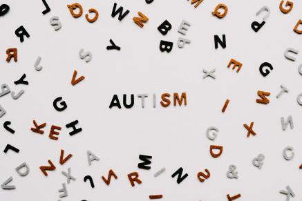 Felt letters spell out the word "Autism"