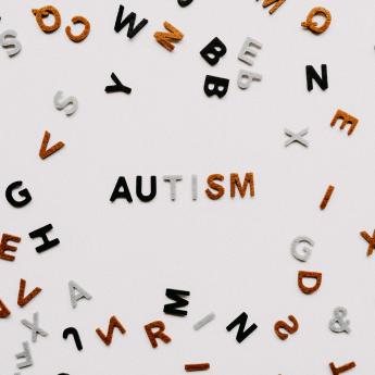 Felt letters spell out the word "Autism"